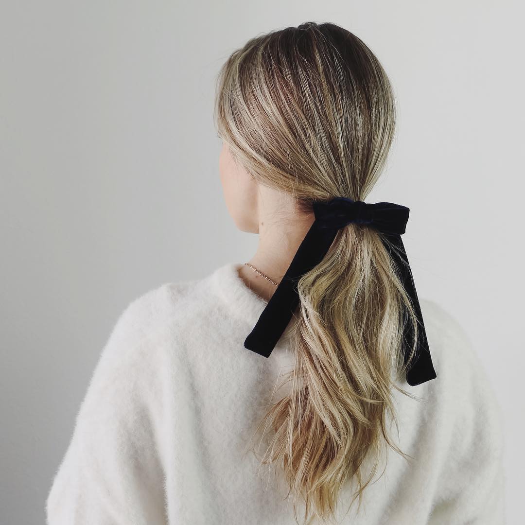 low ponytail with a bow