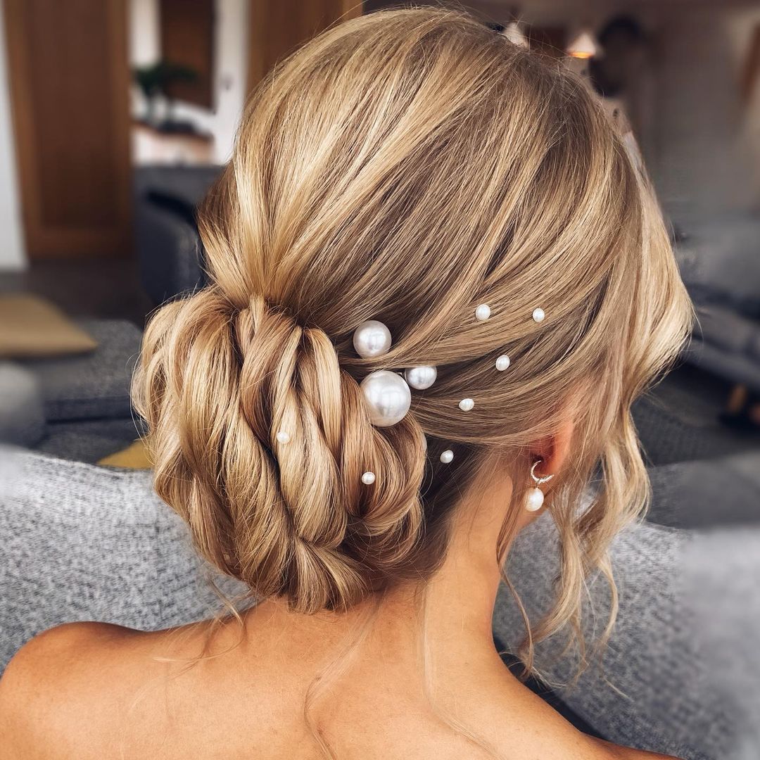 low wedding bun with pearls