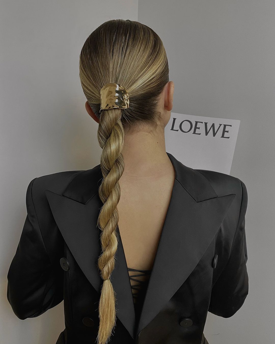 low ponytail into a braid with hair clip