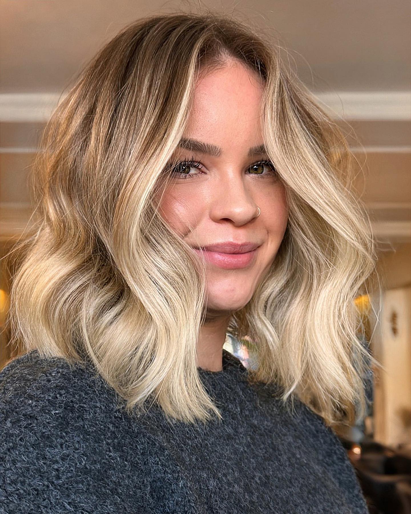blonde lob with beach waves