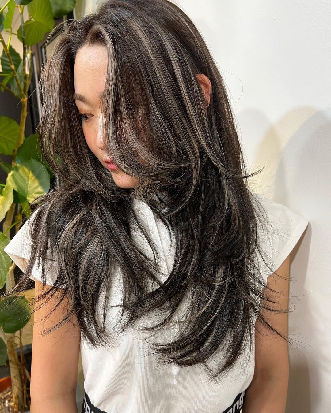Asian layered hair with highlights