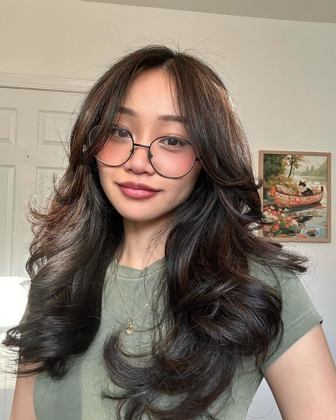 Asian layered haristyle for women with glasses