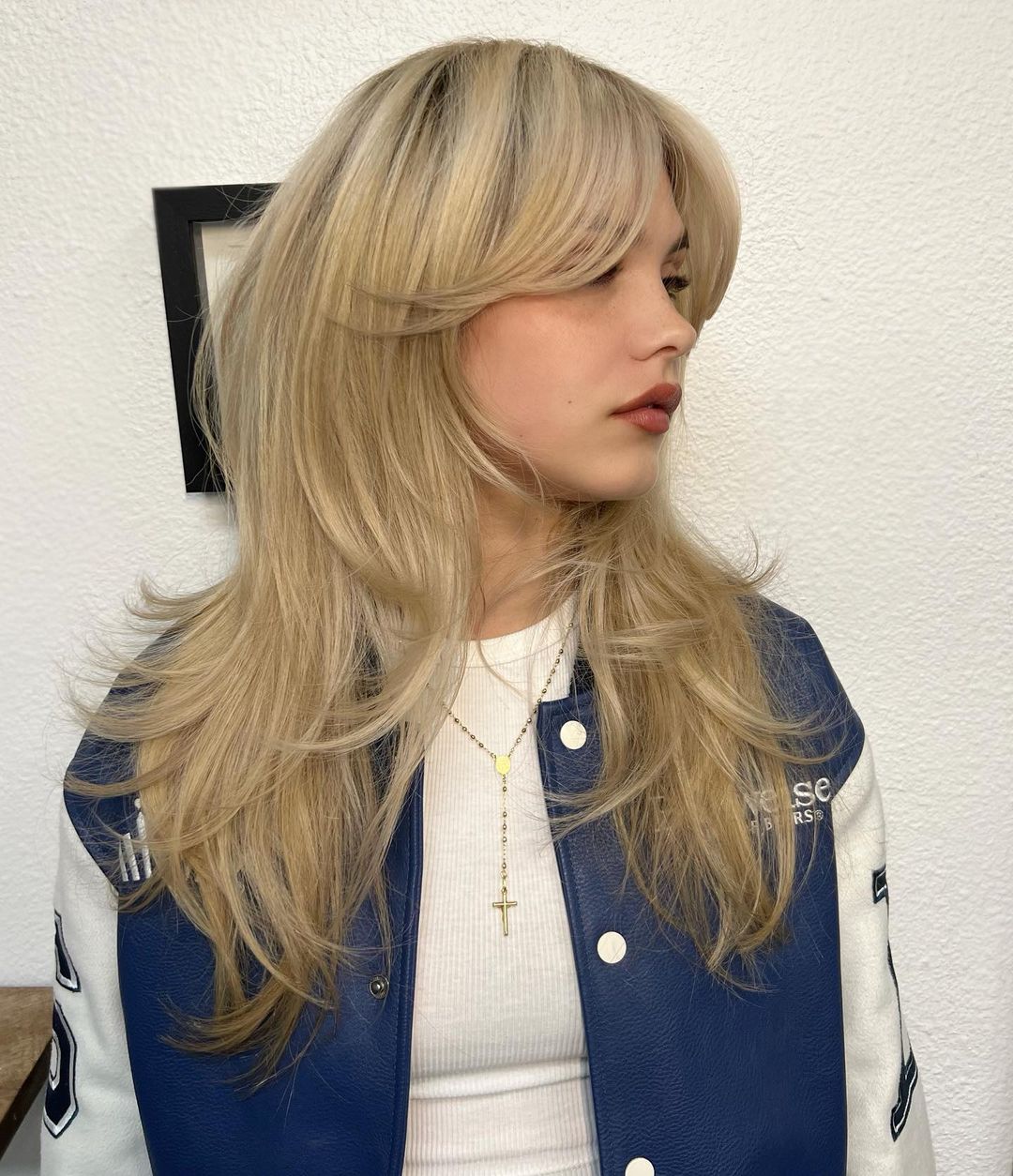 creamy blonde hair with wispy layers