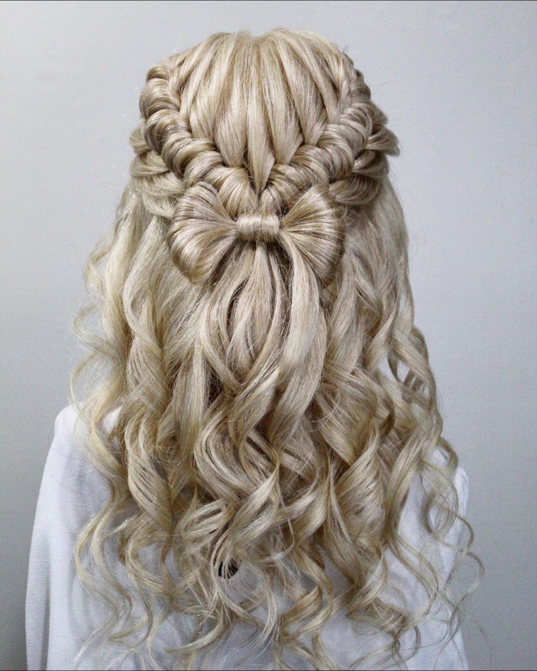half up hair bow with a braid
