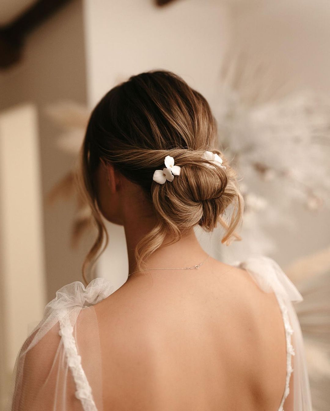 low bun with accessory