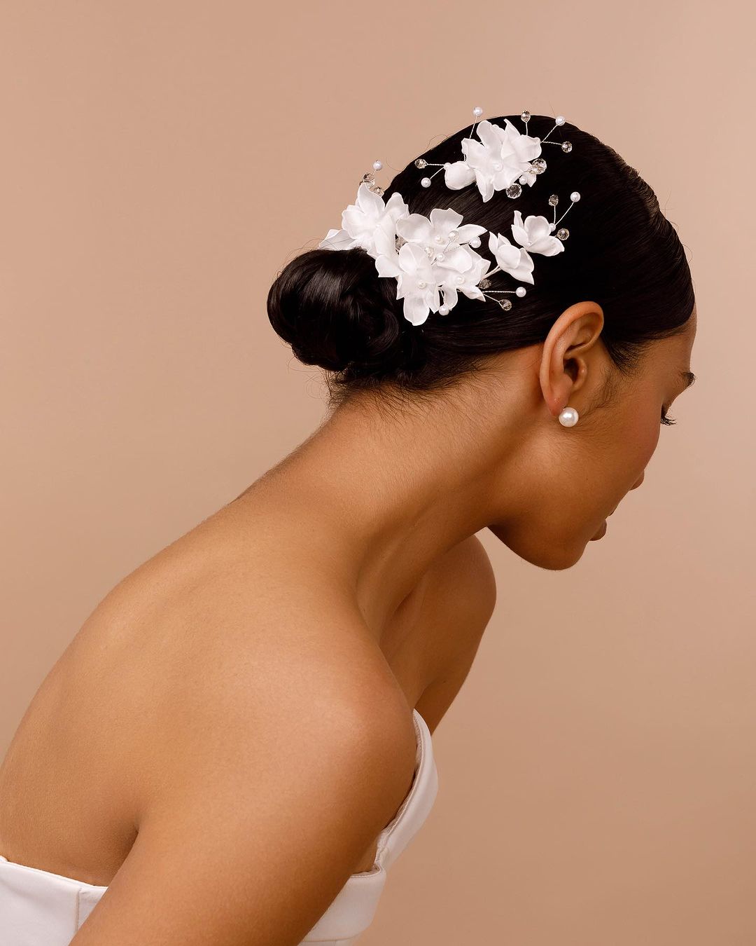 low bun with hair accessory