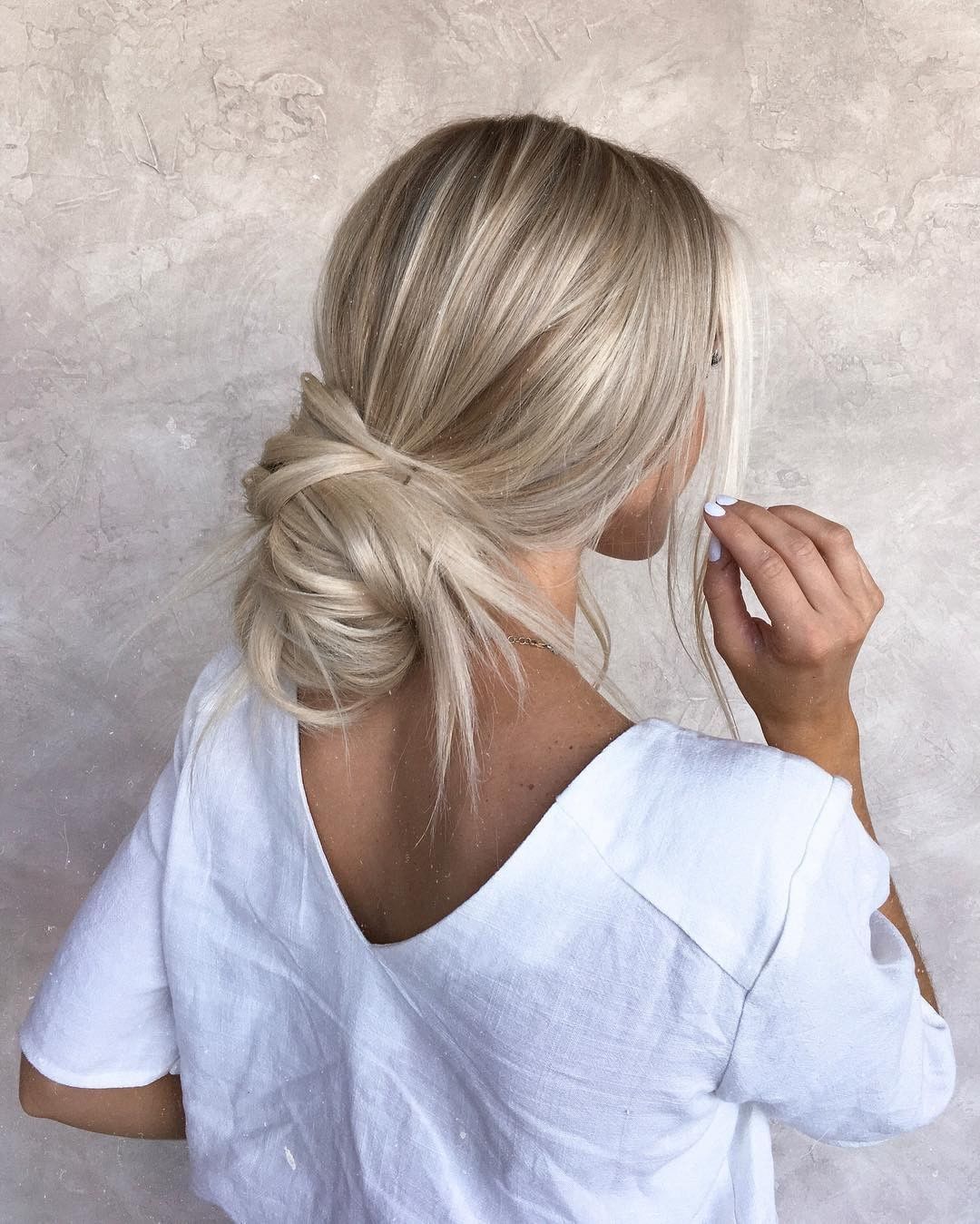 low messy bun for straight hair