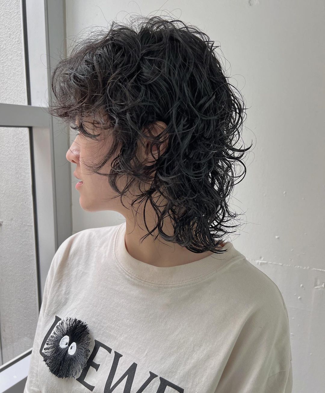 wolf cut with cold wave perm