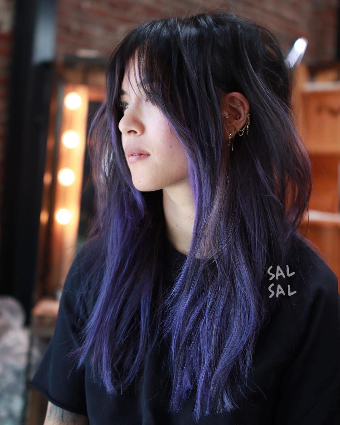 wolf cut with purple highlights