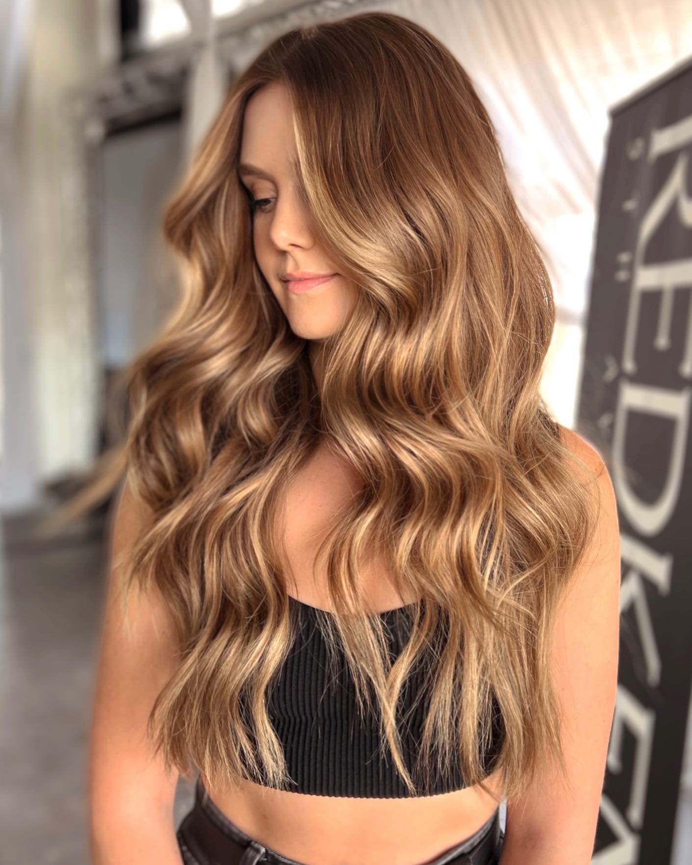 warm sandy brown hair with babylights