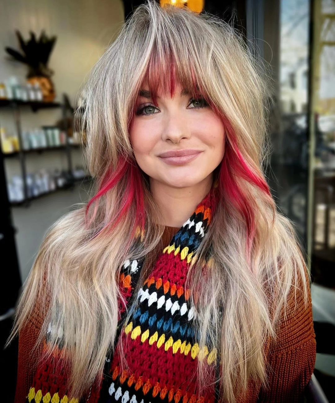 blonde wolf cut with cherry red highlights 
