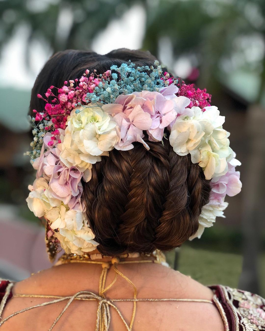 braided bun with flowers