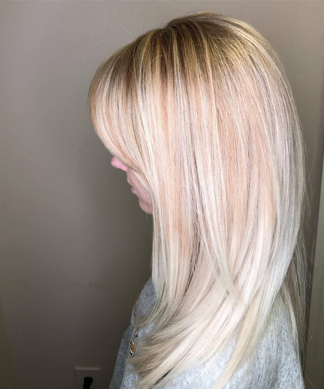 bright blonde with hints of strawberry blonde lowlights