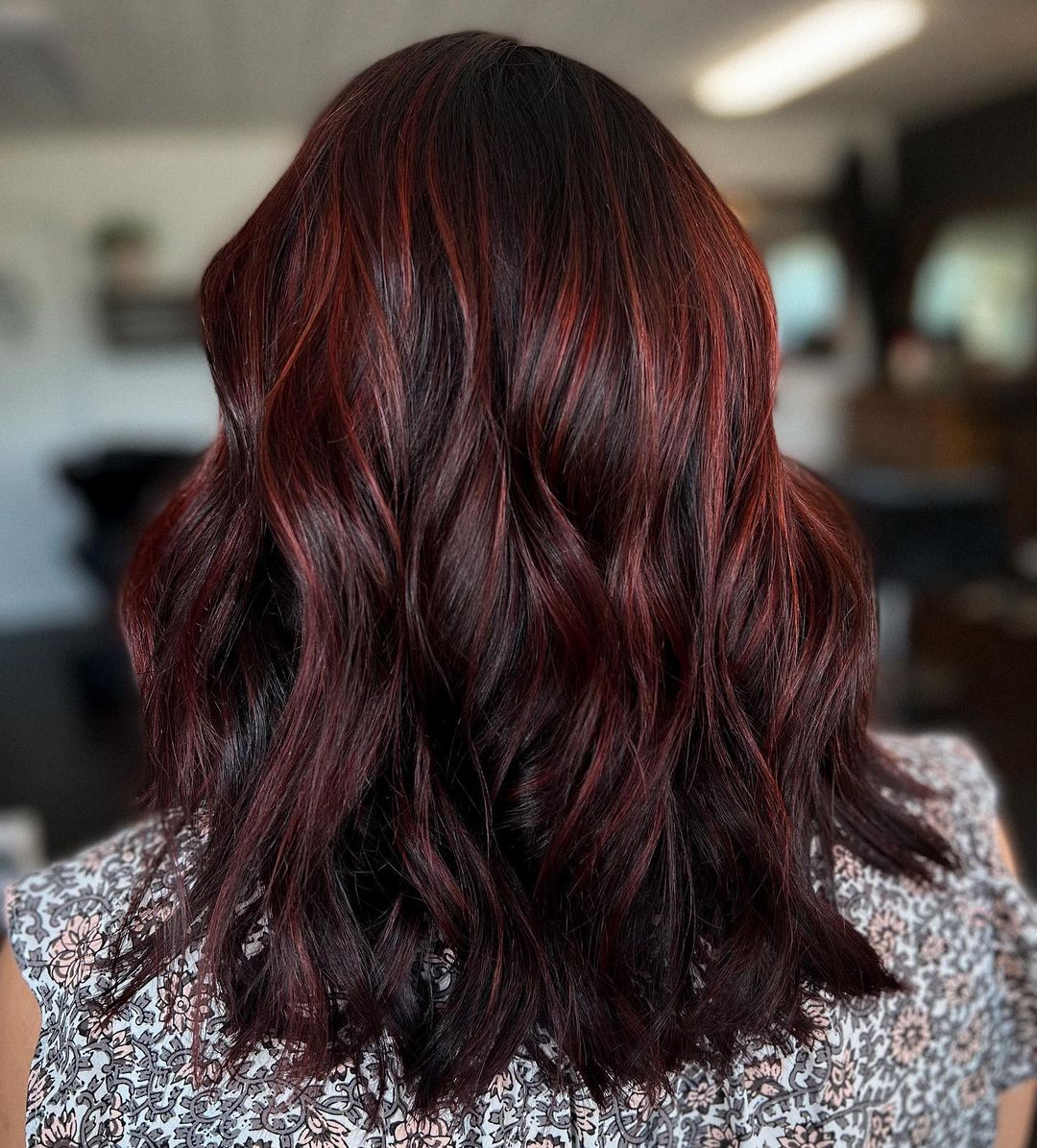 brunette hair with cherry cola highlights