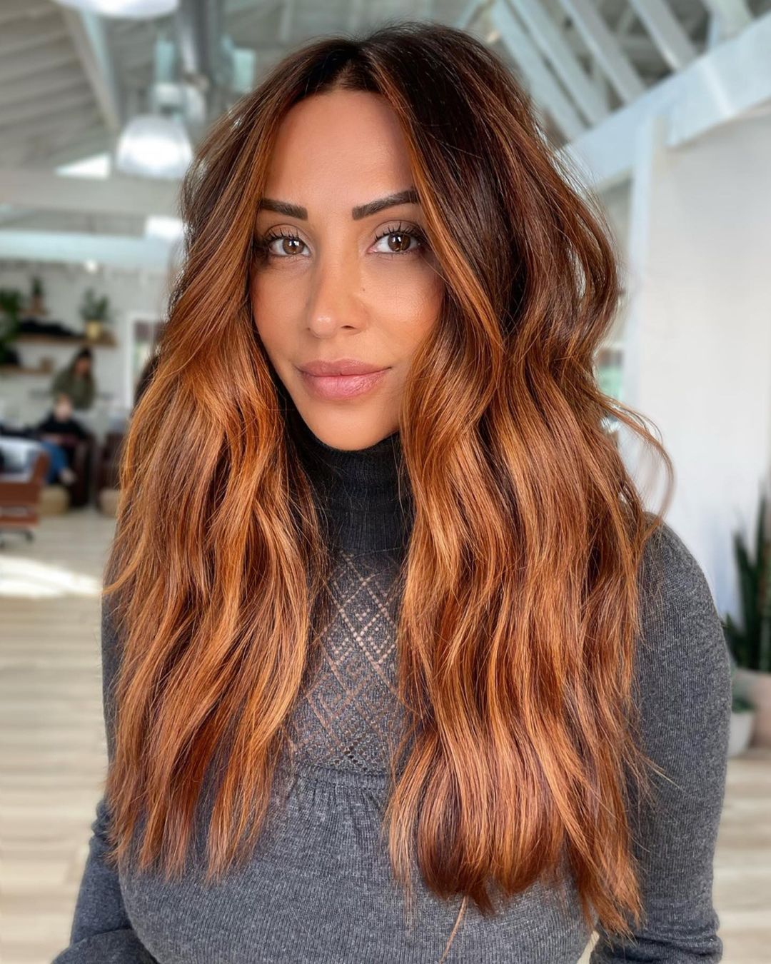 copper balayage with face-framing layers