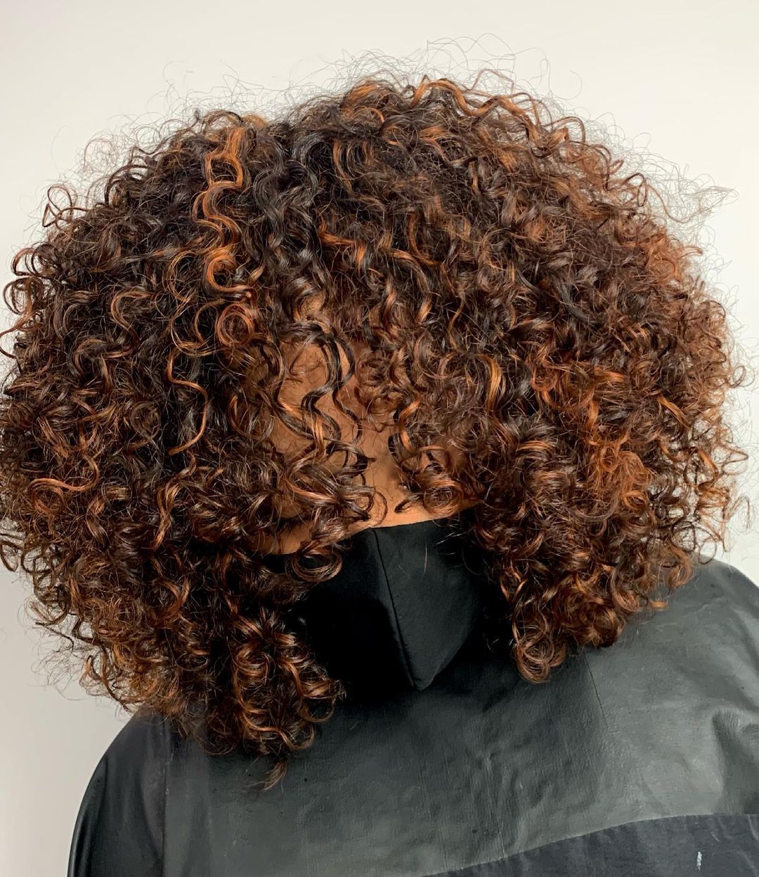 copper highlights rezo cut for curly hair
