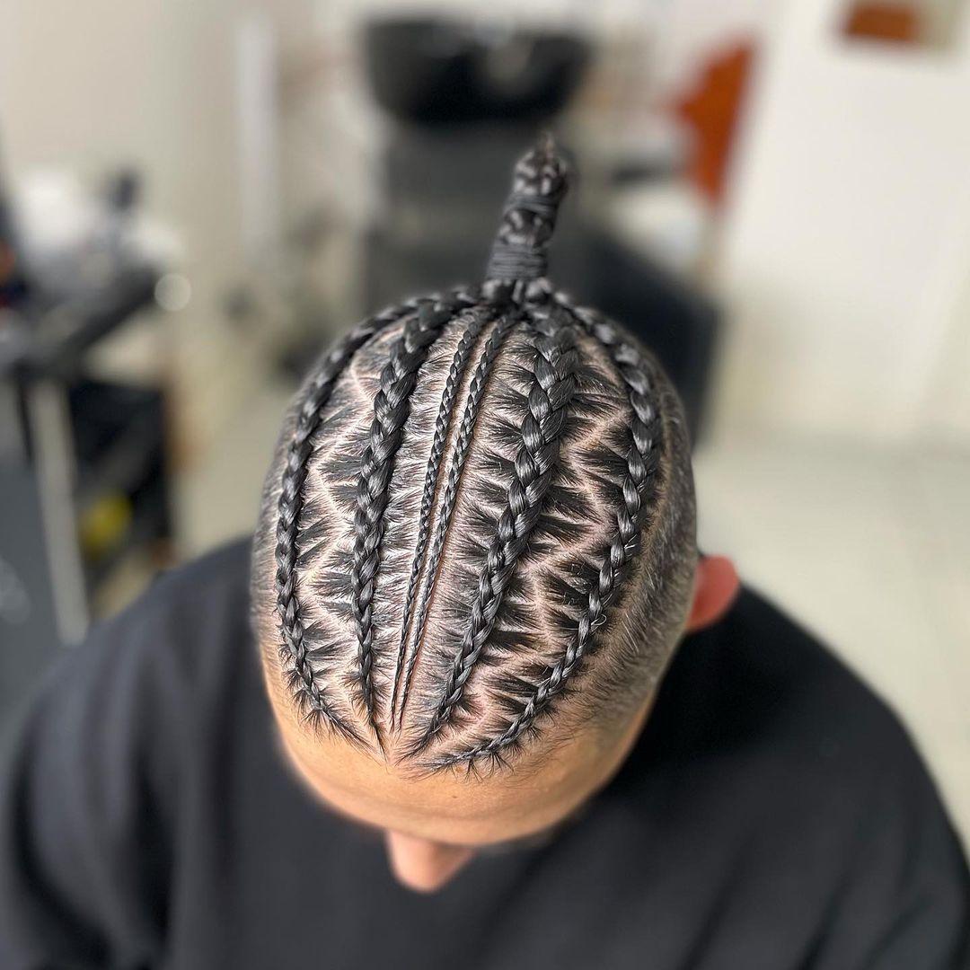 cornrow braids into a bun with zig zag partings