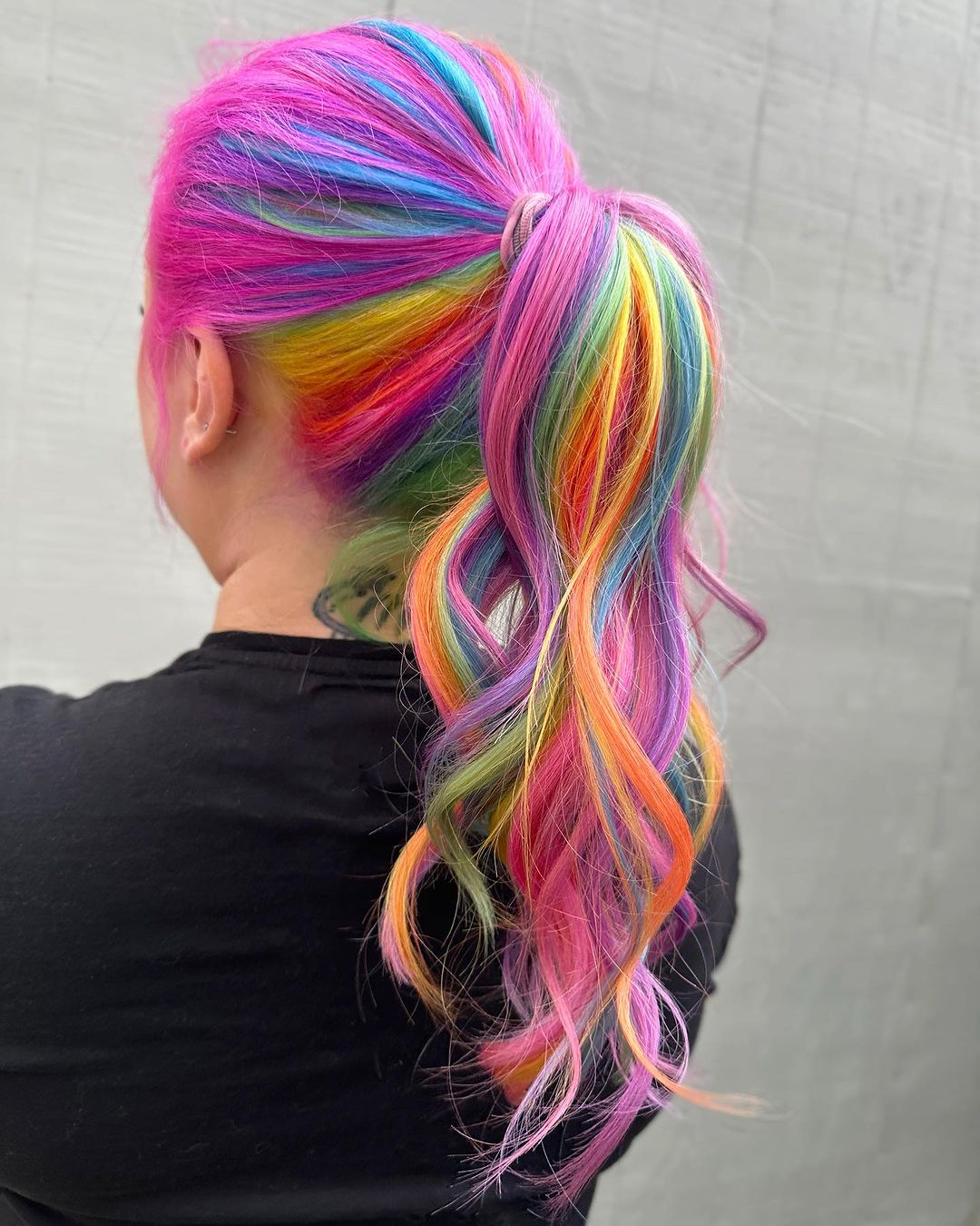 rainbow hair in a ponytail
