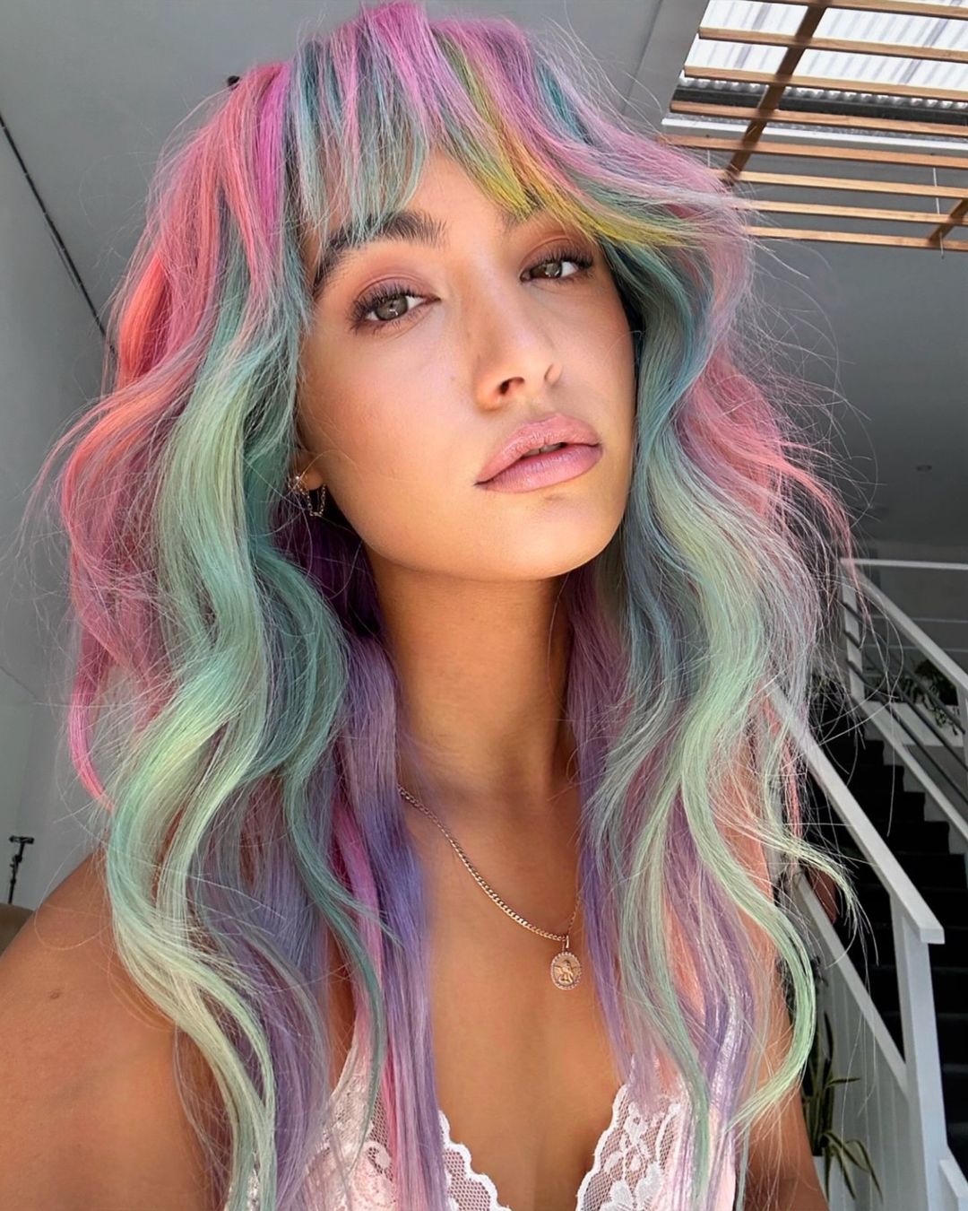 rainbow hair with curtain bangs