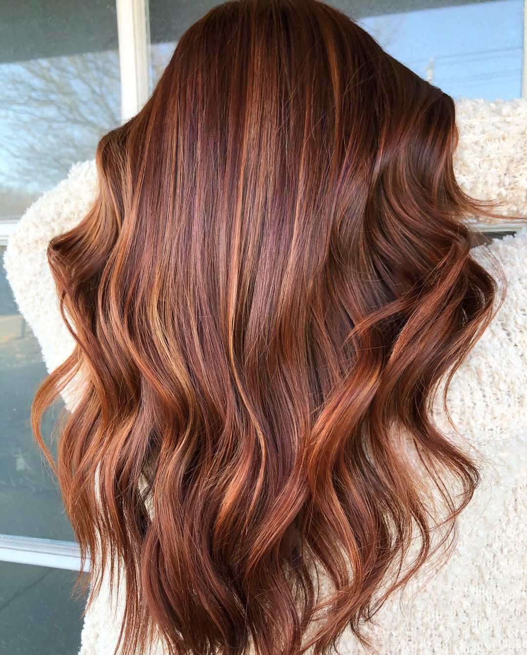 rich brunette with copper highlights V-cut