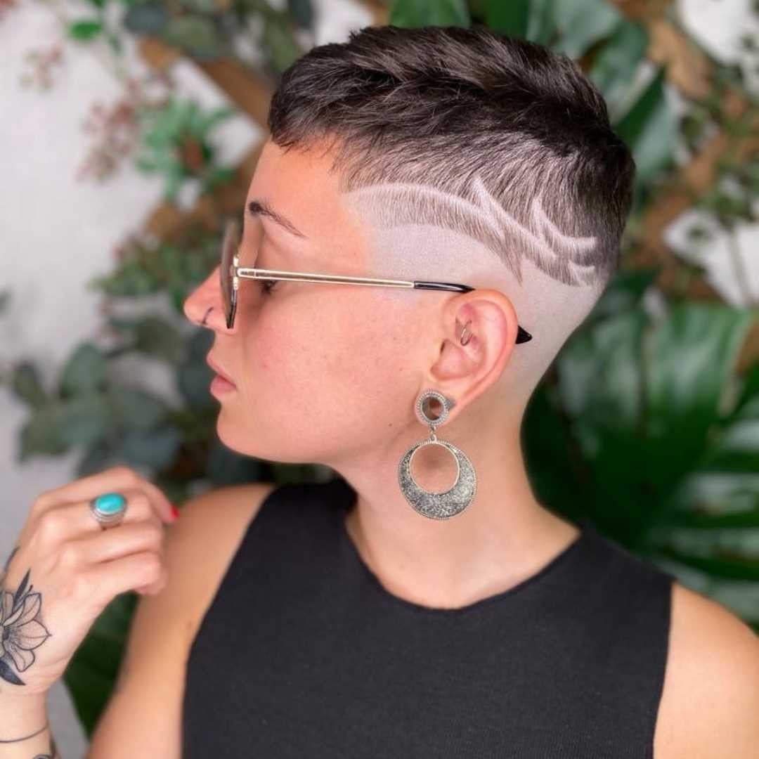 short hair with shaved sides with a freestyle hair design