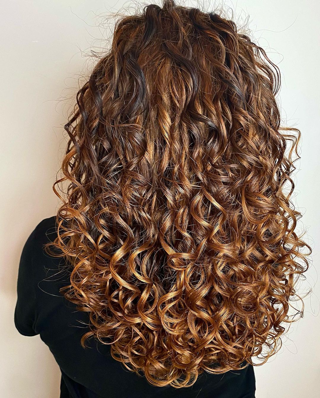 gold copper curly balayage