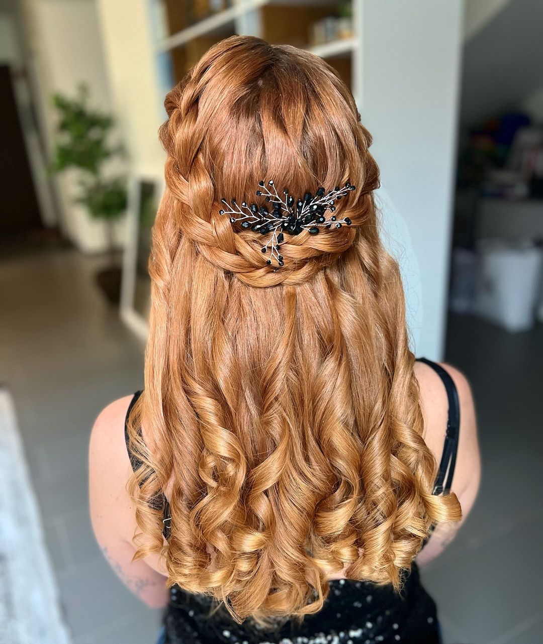 half up braided curly hairstyle