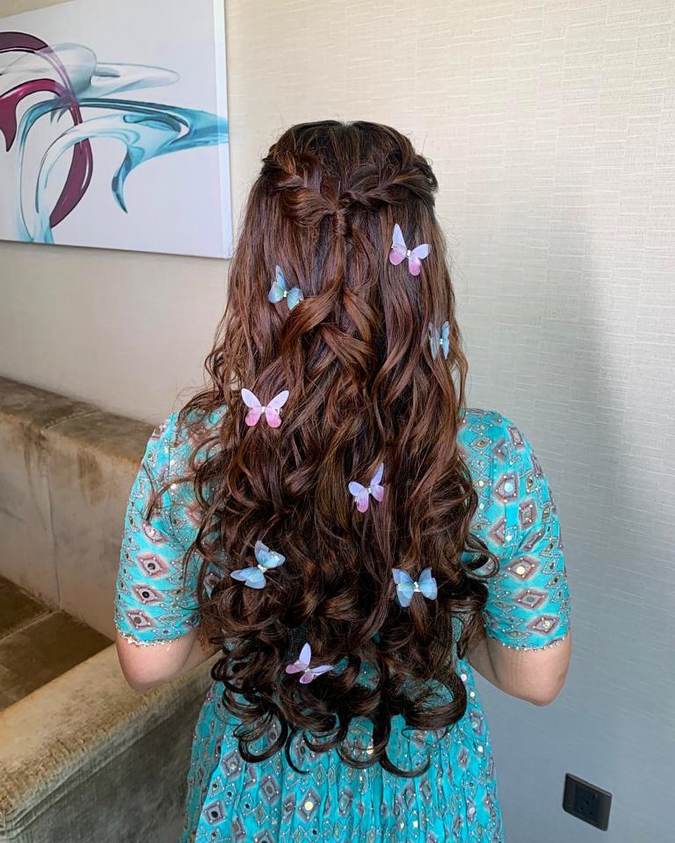 half up half down with braids and butterflies