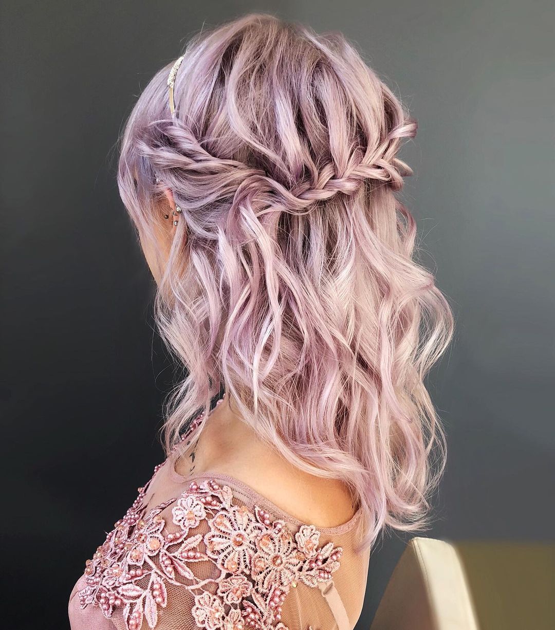 pastel pink blonde braided half up half down hairstyle