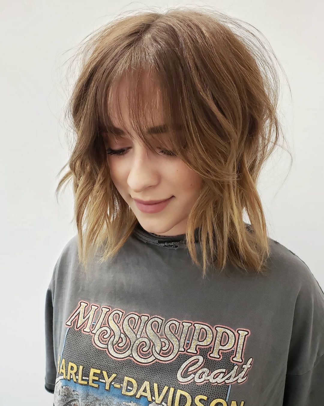 short and thin hair with french bangs