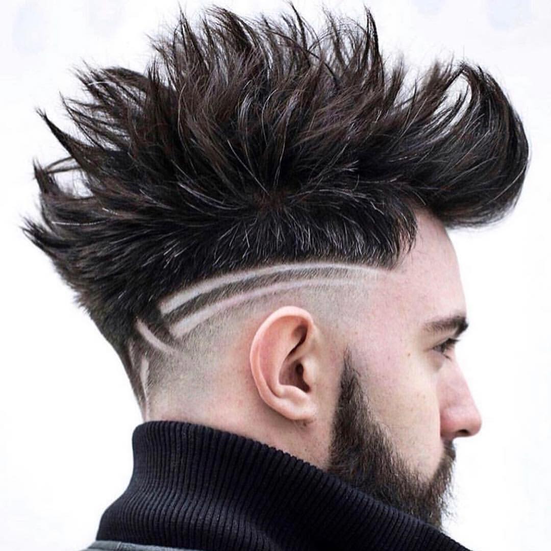spiky hair with mid fade and hair design