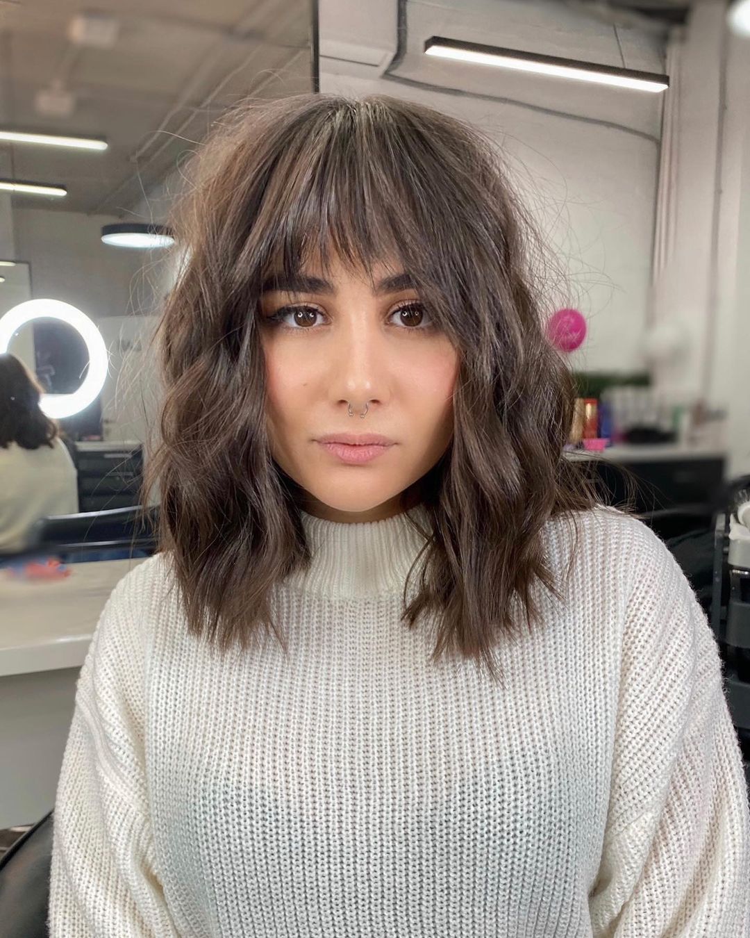 textured lob with french bangs