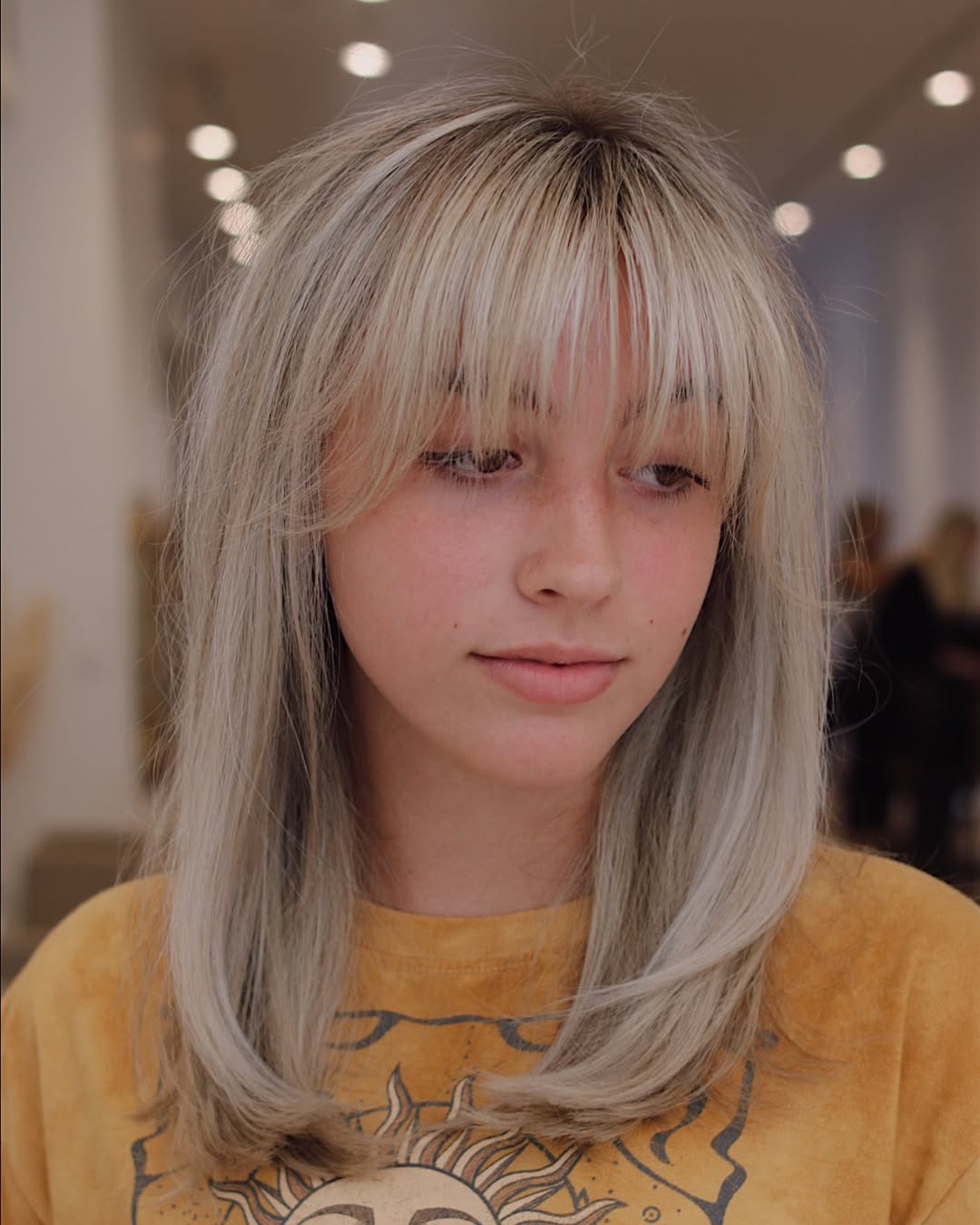 wispy bangs cut