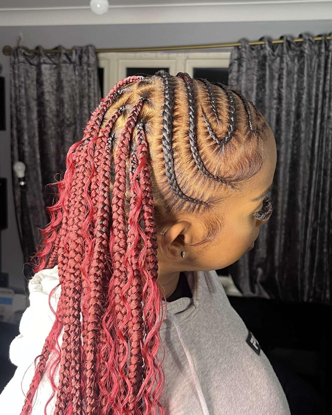 cornrows with mahogany box braids and curly weave