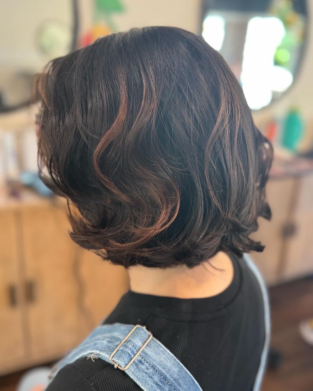 cute layered bob with caramel sunkissed highlights