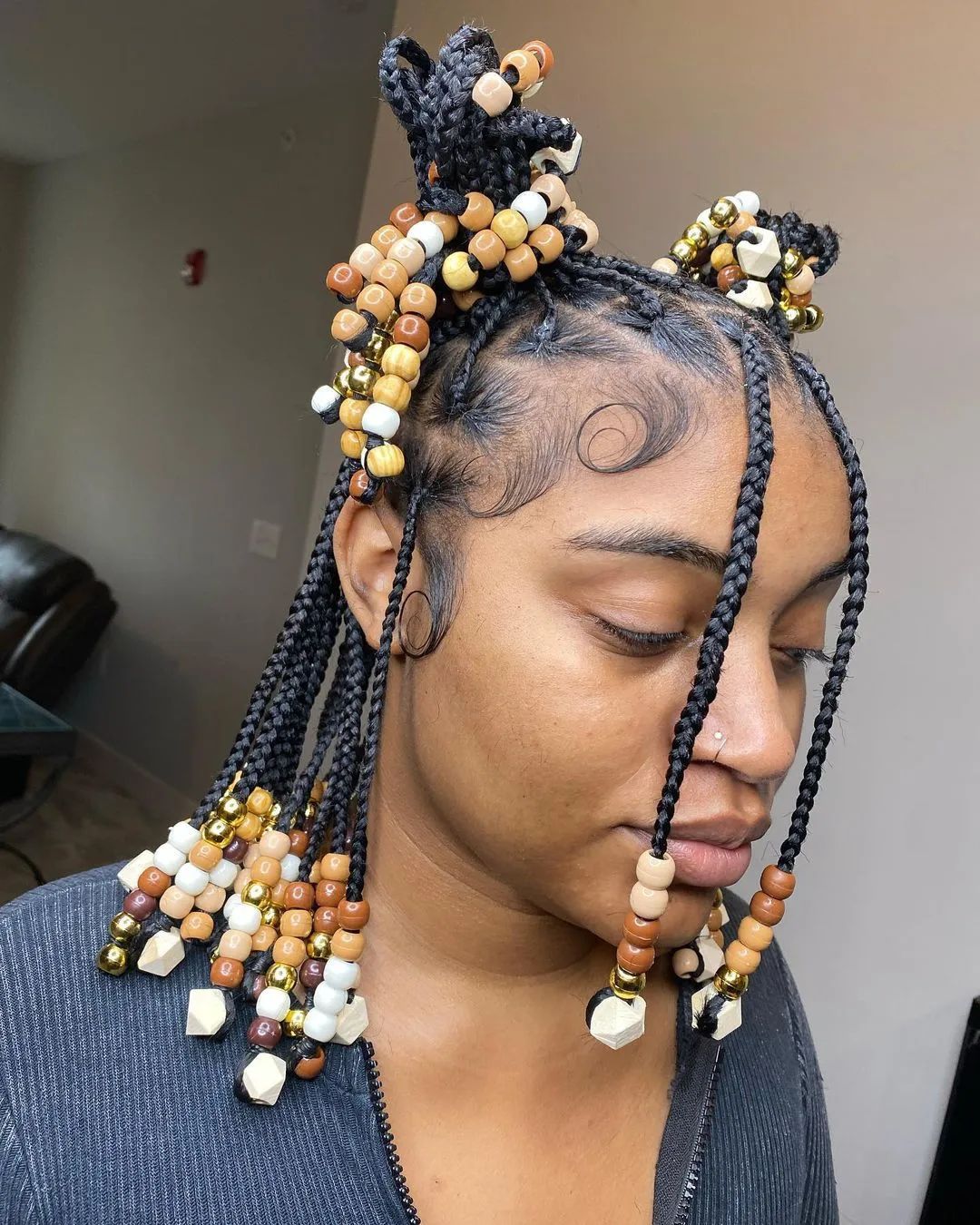 half up braided space buns with beads