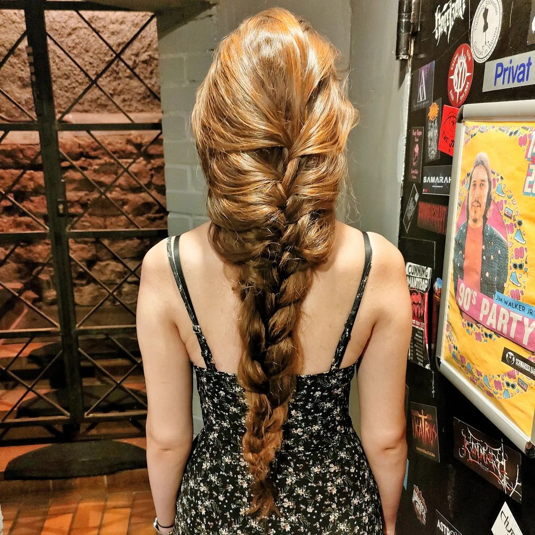 mermaid braid on very long brunette hair