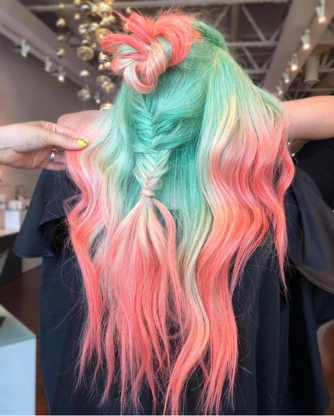 pastel watermelon hair with fishtail braids
