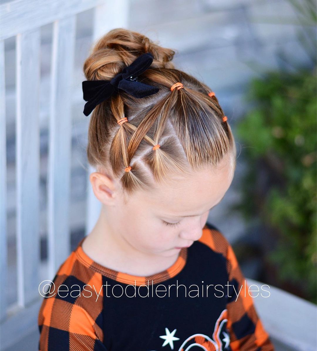 rubber band hairstyle into a high messy bun