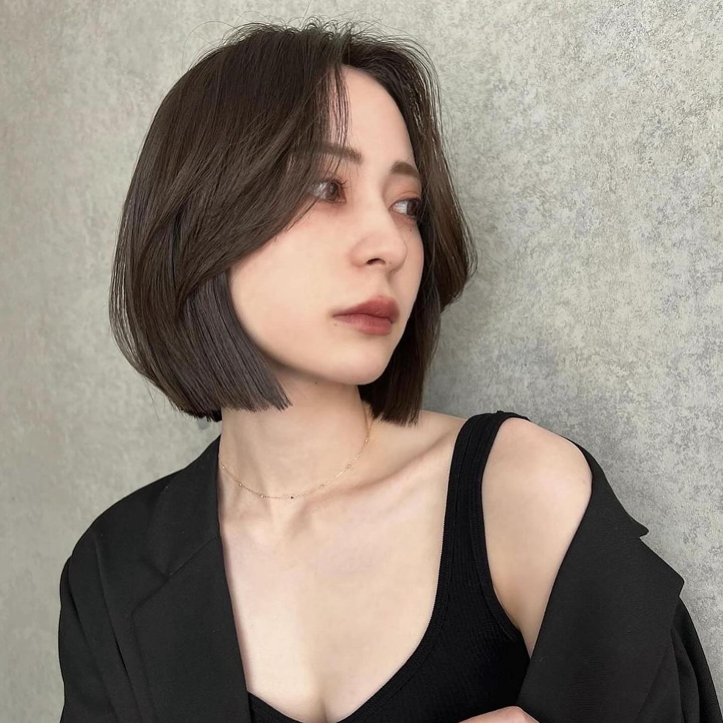 chin-length bob with long bangs