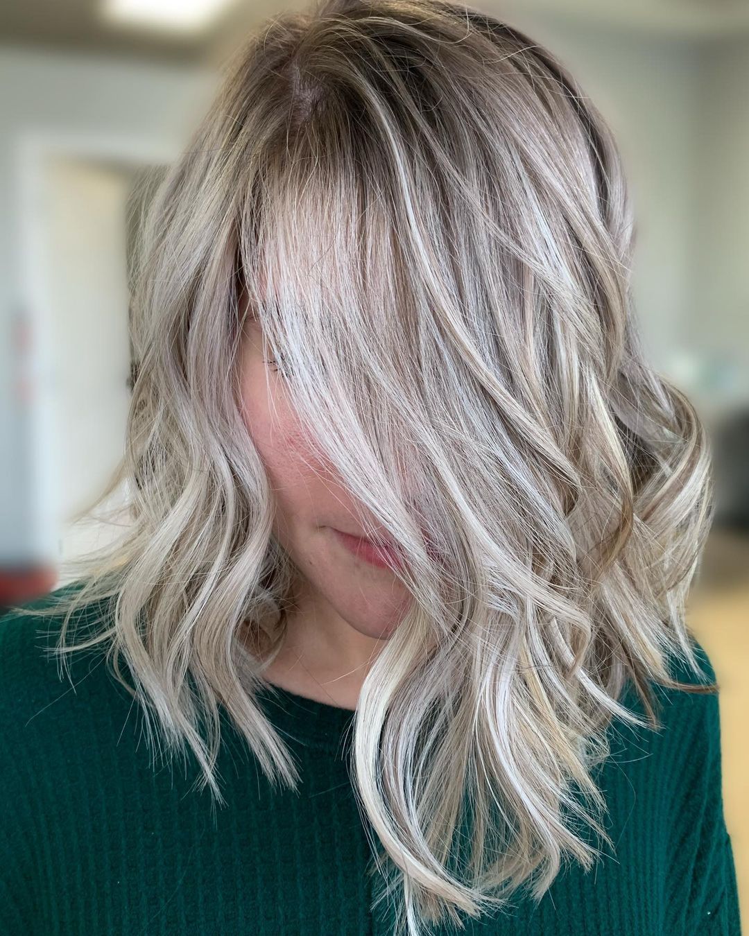 brunette layered hair with platinum blonde highlights