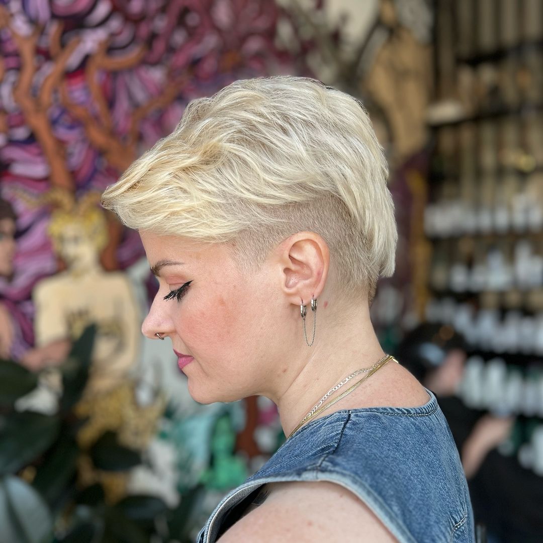 platinum blonde pixie cut with shaved sides