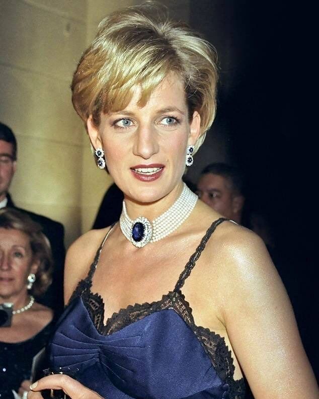 princess Diana with voluminous pixie cut with a deep side part