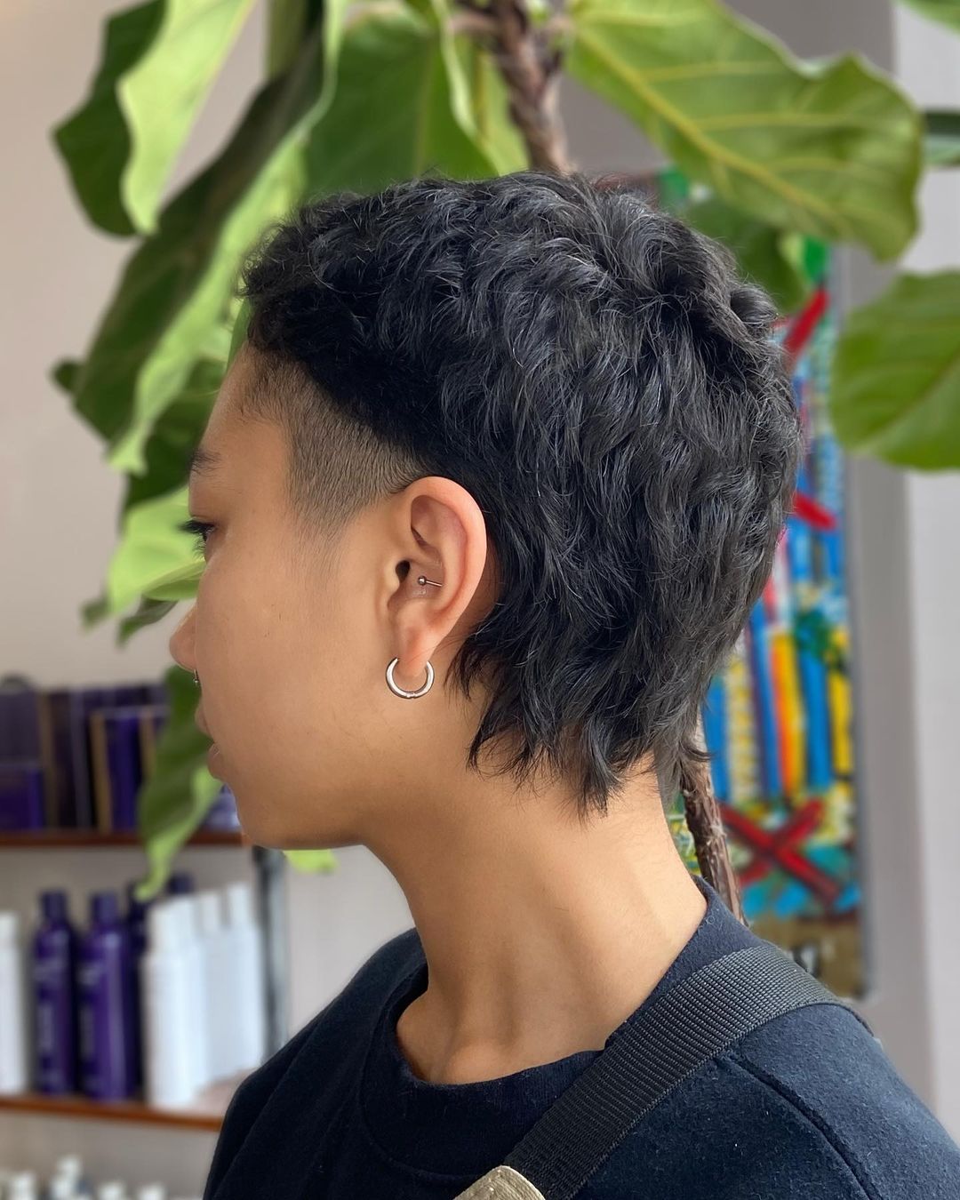 wavy pixie cut with shaved sides