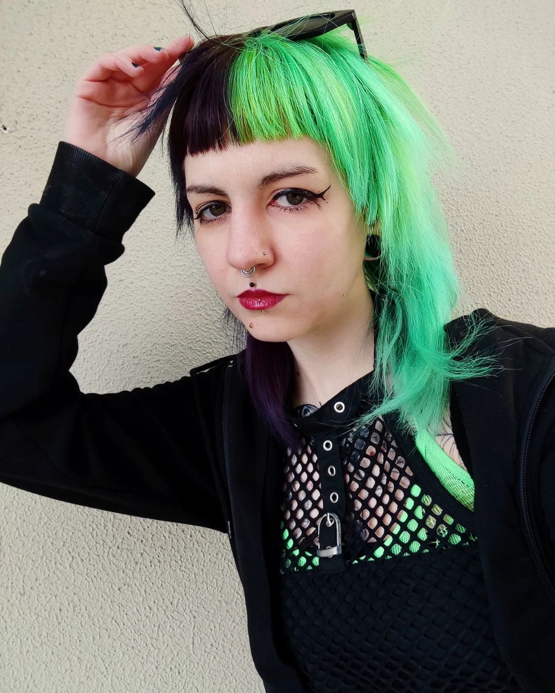 black and green edgy hairstyle