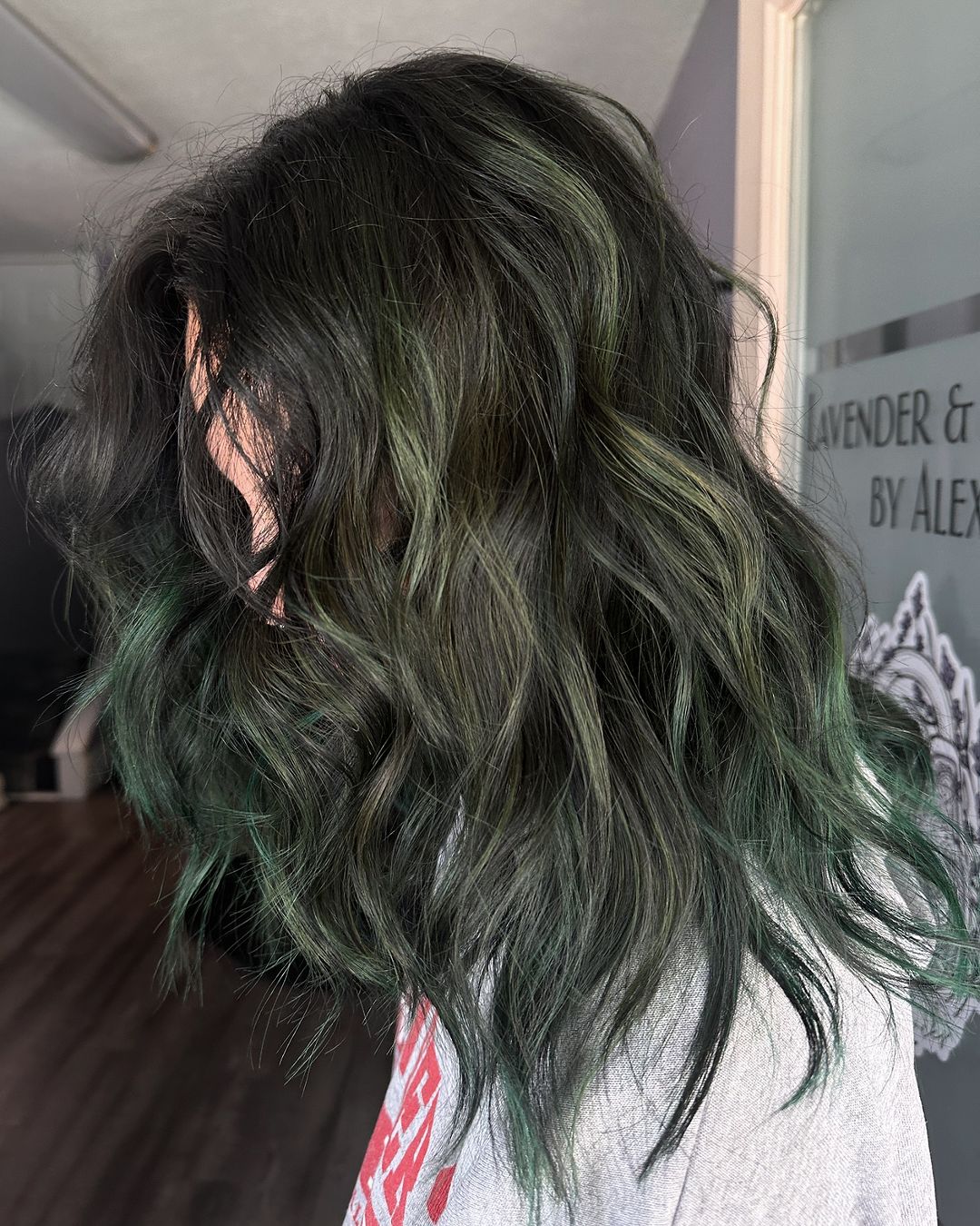 black hair with pops of green