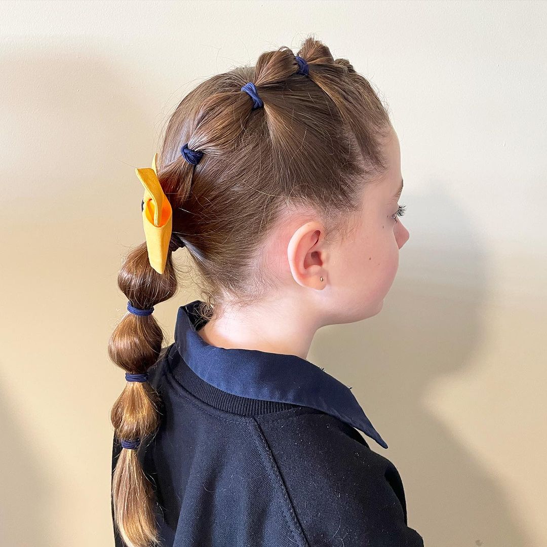 Coiffure avec tresse à bulles