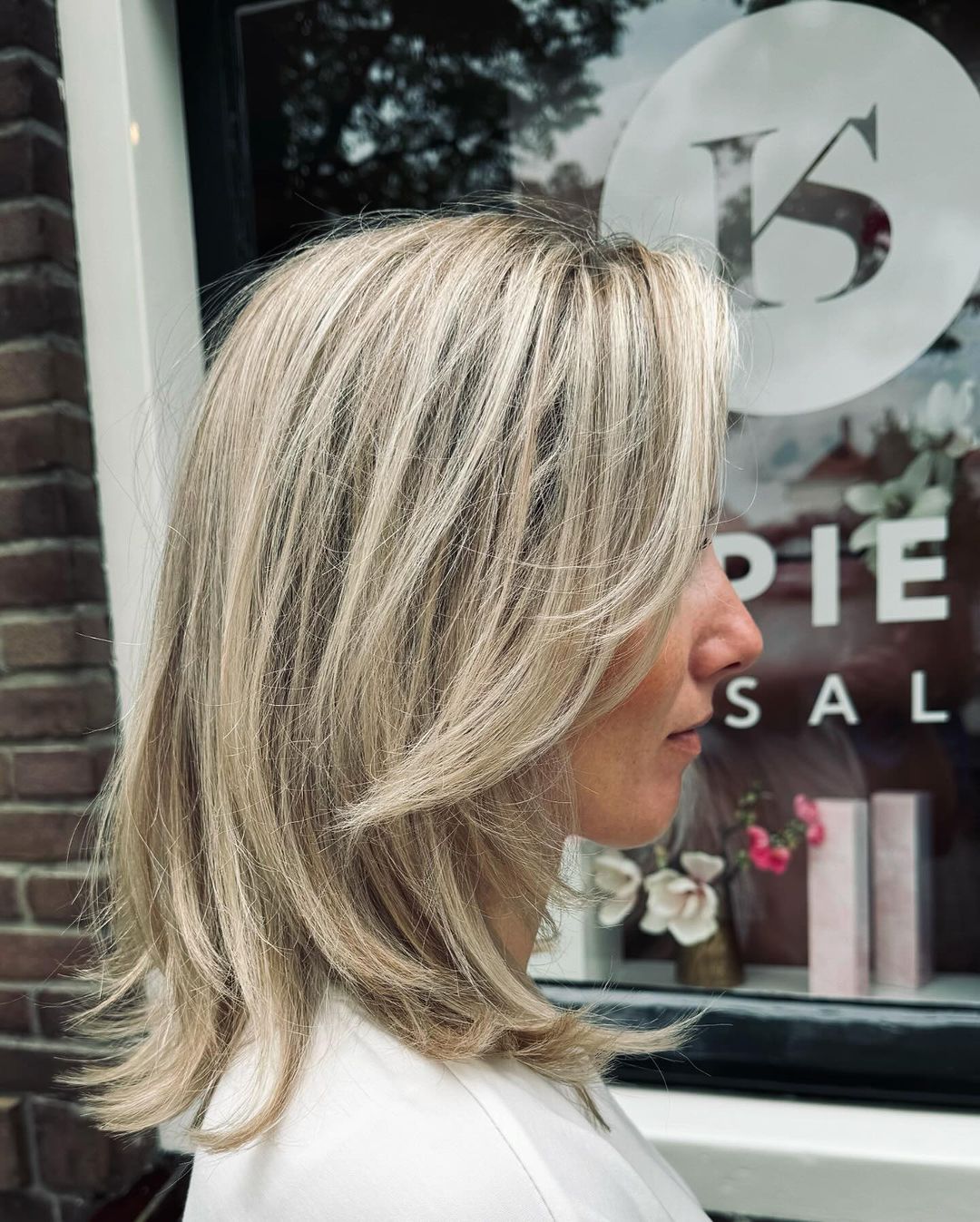 dimensional ash blonde kitty cut