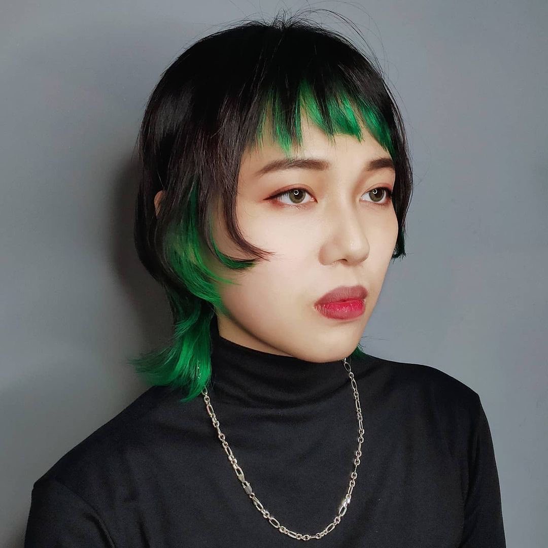 dip-dye emerald green bullet bob haircut