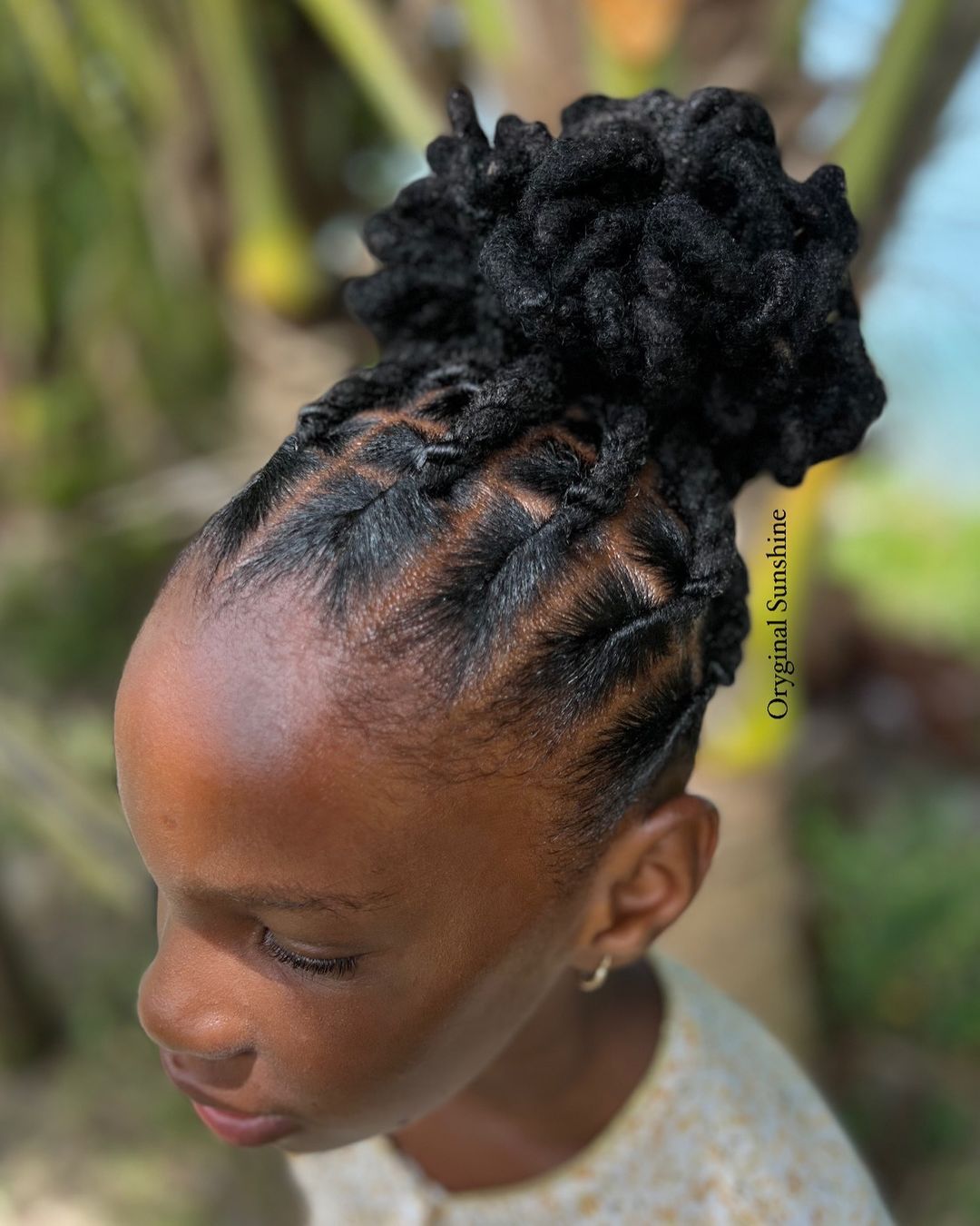 flat twist loc petal bun